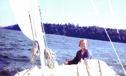 J. R. at the helm of Clipper Mac